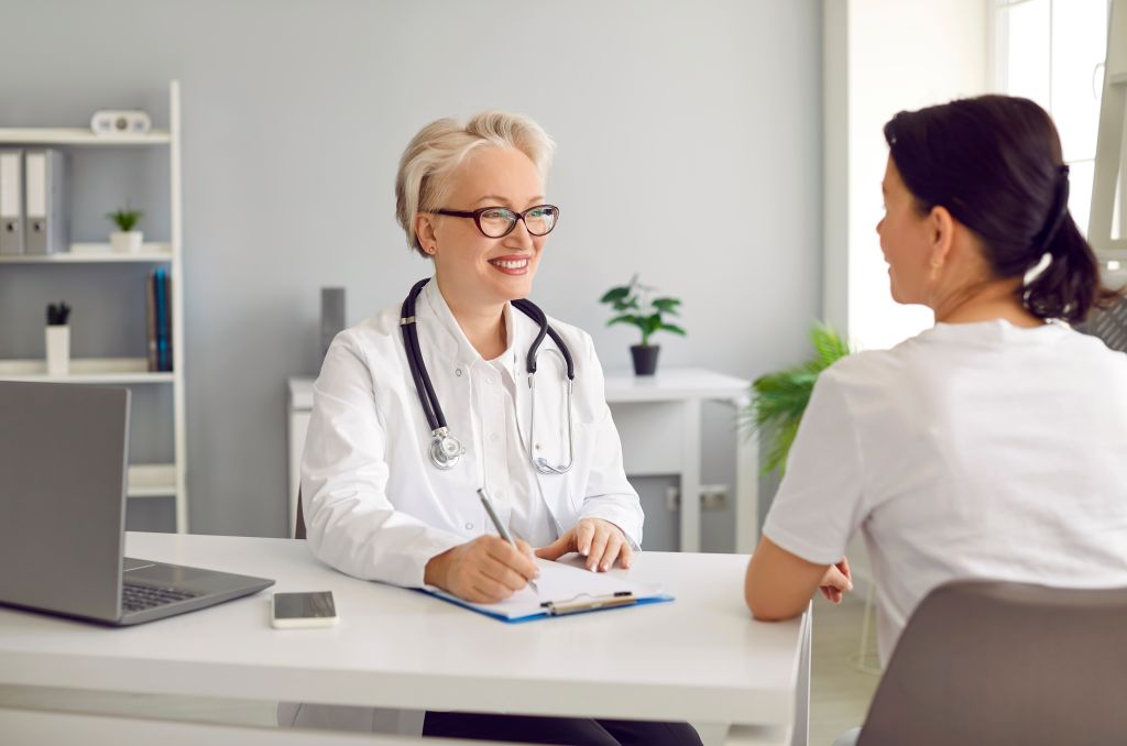  doctor speaking with a patient 