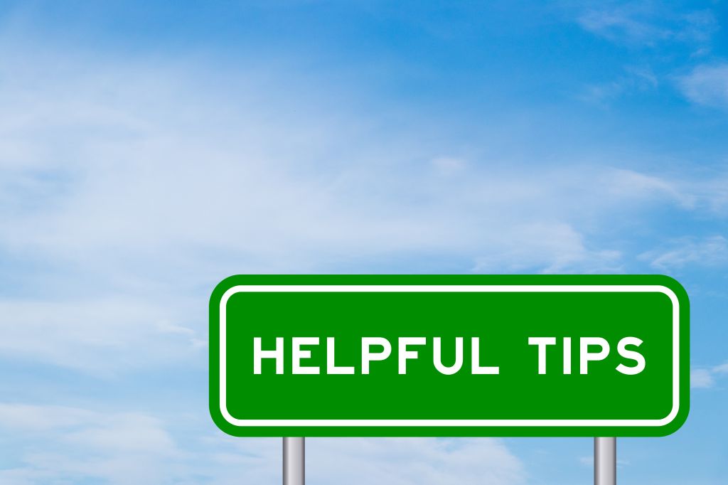 Helpful tips on a street sign