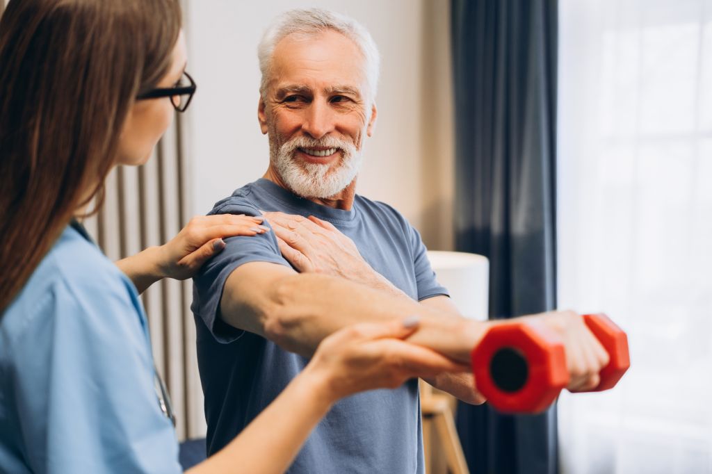 Senior man doing rehab exercises
