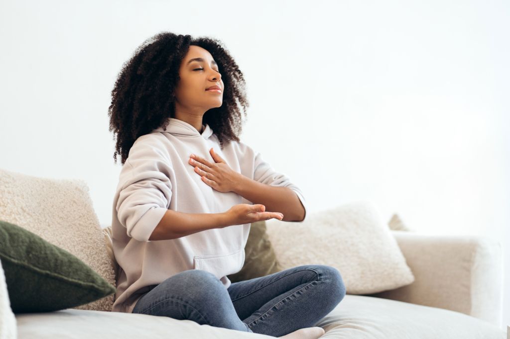 Woman practicing deep breathing